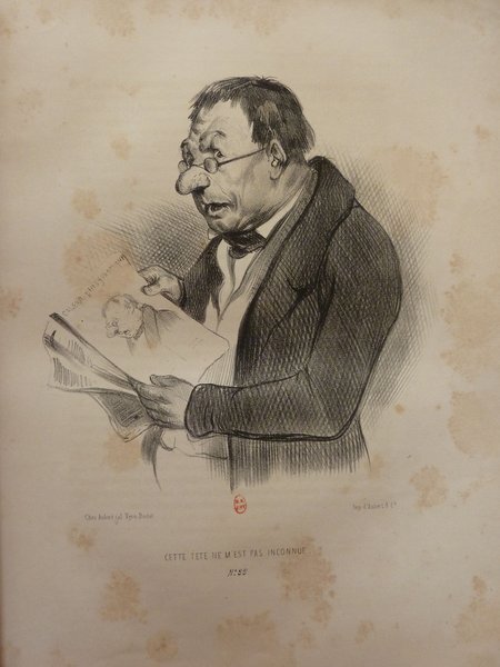 An illustration of a bourgeois man from the July Monarchy era viewing a caricature, featuring distinctive components like a pince-nez. He wears a formal outfit indicative of the bourgeoisie class and holds a paper or book, examining it closely. The background is plain, accentuating the subject and his activity.