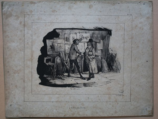 Black and white print depicting a street scene with two figures in front of a small book stall, displaying various prints. One figure, possibly a street vendor, is wearing a top hat and pince-nez, and the other, also wearing a hat, appears to be a customer. The setting suggests a theme related to book selling and merchant exchanges during the July Monarchy era.