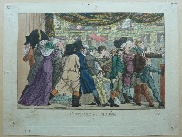 This historical image portrays a bustling scene at an exhibition, featuring an audience in Empire-era bourgeois outfits, observing paintings at a salon. Both men and women are depicted; the men primarily wearing bicornes and top hats, and the women in long dresses. The setting and attire evoke the period distinctly characterized by such fashion elements.