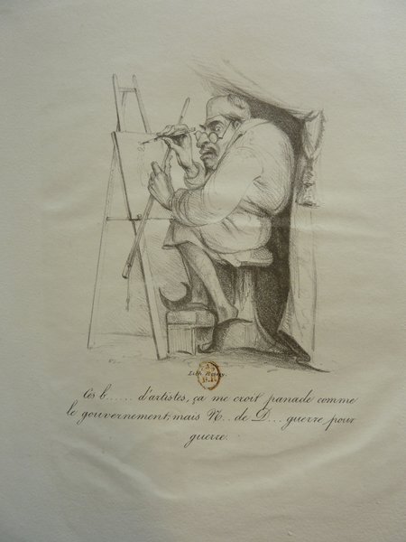 A drawing depicting an artist wearing a smock and pince-nez, probably the caricature character Mayeux, seated before an easel in a studio. The artist uses a brush on a canvas, in a style reminiscent of the July Monarchy era. Visible elements include painter's tools and a draped backdrop.