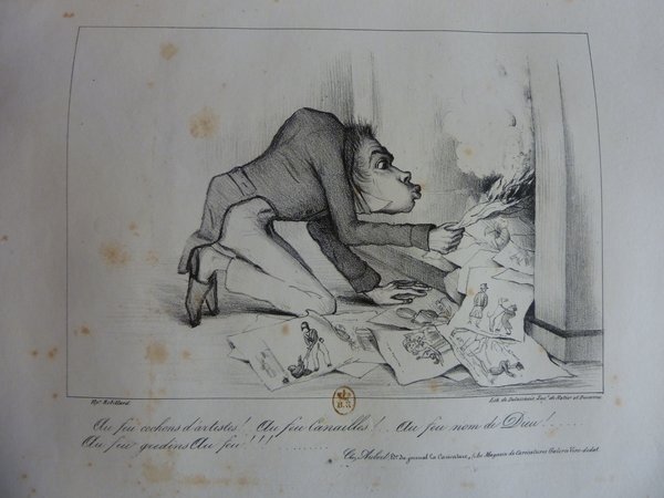 A caricature from the July Monarchy era depicting a figure resembling Mayeux, kneeling indoors and feeding paper into a furnace fire. The paper includes drawings and caricatures.