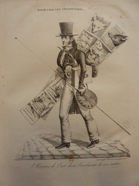 A man with long hair wearing a top hat holds a palette and mahlstick, standing on a cobblestone street. He carries signs with images and text attached to his back. The setting suggests an artistic theme related to painters and restoration, possibly in front of a store or shop.